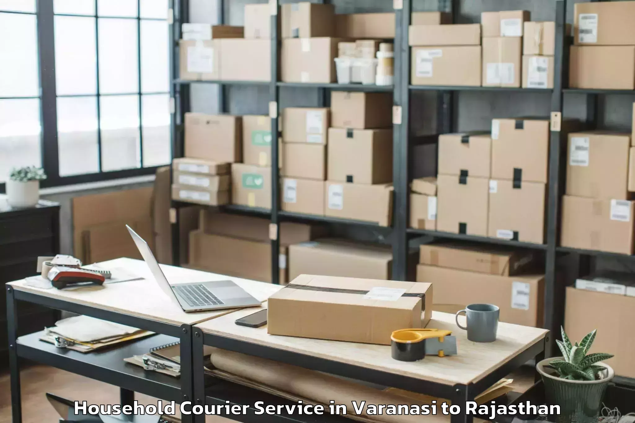 Hassle-Free Varanasi to Jagannath University Jaipur Household Courier